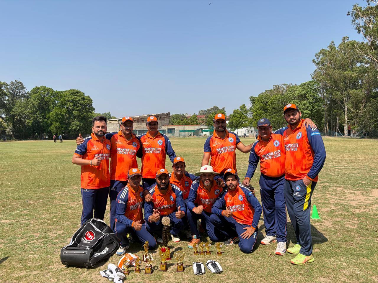 Cricket team posing with trophies at GNPS Cricket Ground